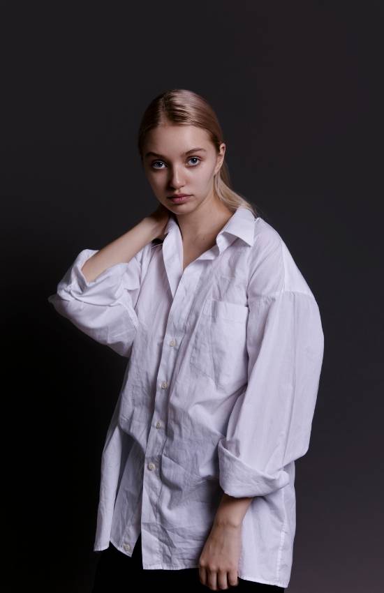 women wearing white oversized shirt